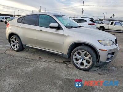Czwarte zdjęcie samochodu z boku: 2010 BMW X6 XDRIVE35I VIN:5UXFG4C53AL226083 - miniatura