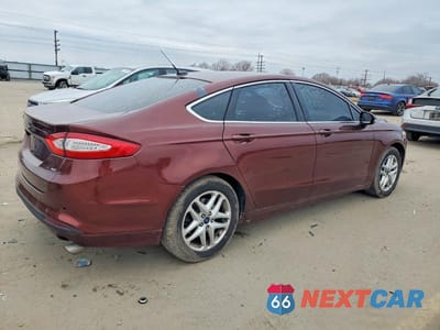 Trzecie zdjęcie samochodu z tyłu: 2016 FORD FUSION SE VIN:3FA6P0H92GR355695 - miniatura