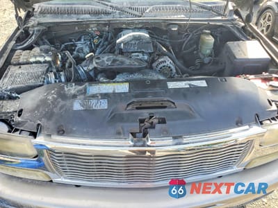 Zdjęcie 12 z 13 samochodu: 2000 CHEVROLET SUBURBAN C1500 VIN:3GNEC16T7YG111907 - miniatura