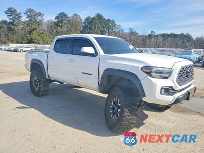 Czwarte zdjęcie samochodu z boku: 2023 TOYOTA TACOMA DOUBLE CAB VIN:3TMCZ5AN5PM589841 - miniatura