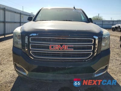 Piąte zdjęcie samochodu w środku: 2018 GMC YUKON SLE 1500 VIN:1GKS1AKC6JR137464 - miniatura