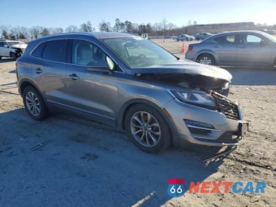 Czwarte zdjęcie samochodu z boku: 2017 LINCOLN MKC SELECT VIN:5LMCJ2C95HUL50348 - miniatura