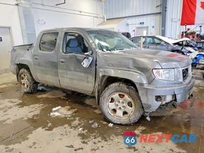 Czwarte zdjęcie samochodu z boku: 2009 HONDA RIDGELINE RTL VIN:2HJYK16559H003325 - miniatura