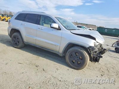 Czwarte zdjęcie samochodu z boku: 2012 JEEP GRAND CHEROKEE LAREDO VIN:1C4RJFAG2CC148740 - miniatura
