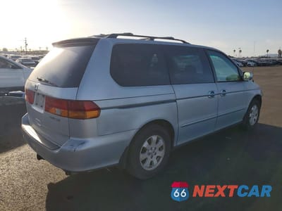 Trzecie zdjęcie samochodu z tyłu: 2002 HONDA ODYSSEY EXL VIN:2HKRL18042H584689 - miniatura