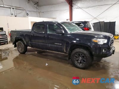 Czwarte zdjęcie samochodu z boku: 2021 TOYOTA TACOMA DOUBLE CAB VIN:5TFDZ5BN1MX066454 - miniatura