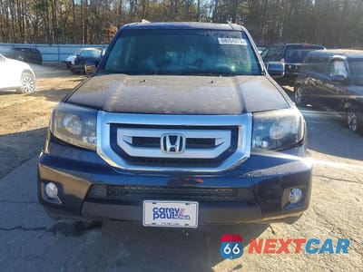 Piąte zdjęcie samochodu w środku: 2009 HONDA PILOT EXL VIN:5FNYF38569B006032 - miniatura