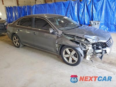 Czwarte zdjęcie samochodu z boku: 2012 VOLKSWAGEN PASSAT SE VIN:1VWBH7A30CC022602 - miniatura