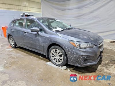 Czwarte zdjęcie samochodu z boku: 2018 SUBARU IMPREZA VIN:4S3GTAA60J3731171 - miniatura