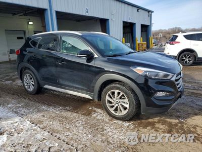Czwarte zdjęcie samochodu z boku: 2017 HYUNDAI TUCSON LIMITED VIN:KM8J3CA22HU493497 - miniatura