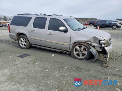 Czwarte zdjęcie samochodu z boku: 2007 CHEVROLET SUBURBAN C1500 VIN:1GNFC160X7J237654 - miniatura