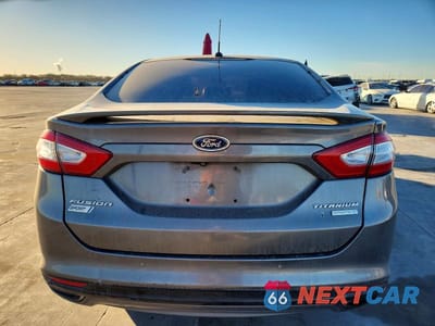 Zdjęcie 6 z 12 samochodu: 2014 FORD FUSION TITANIUM VIN:3FA6P0K93ER238536 - miniatura
