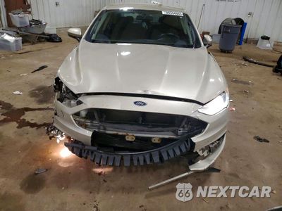 Piąte zdjęcie samochodu w środku: 2017 FORD FUSION SE HYBRID VIN:3FA6P0LU6HR344969 - miniatura