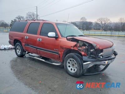 Czwarte zdjęcie samochodu z boku: 2001 CHEVROLET SUBURBAN C1500 VIN:3GNEC16T51G126914 - miniatura