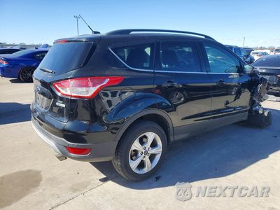 Trzecie zdjęcie samochodu z tyłu: 2014 FORD ESCAPE SE VIN:1FMCU0GX6EUD37207 - miniatura