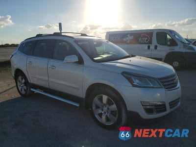 Czwarte zdjęcie samochodu z boku: 2015 CHEVROLET TRAVERSE LTZ VIN:1GNKRJKD0FJ205512 - miniatura