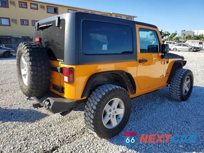 Trzecie zdjęcie samochodu z tyłu: 2012 JEEP WRANGLER SPORT VIN:1C4AJWAG3CL260878 - miniatura