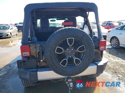 Zdjęcie 6 z 11 samochodu: 2014 JEEP WRANGLER UNLIMITED SAHARA VIN:1C4BJWEG1EL210563 - miniatura