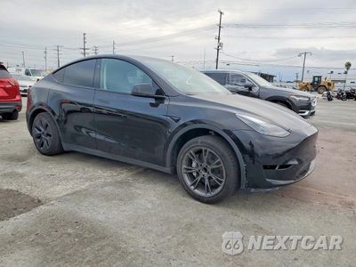 Czwarte zdjęcie samochodu z boku: 2024 TESLA MODEL Y VIN:7SAYGDED9RF204007 - miniatura