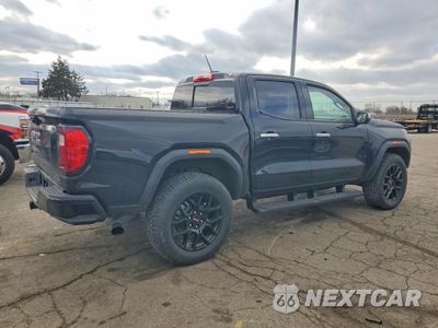 Trzecie zdjęcie samochodu z tyłu: 2026 GMC CANYON DENALI VIN:1GTP2FEK6T1131860 - miniatura