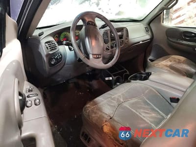 Zdjęcie 8 z 12 samochodu: 1999 FORD F150 VIN:1FTRX18LXXNB58401 - miniatura