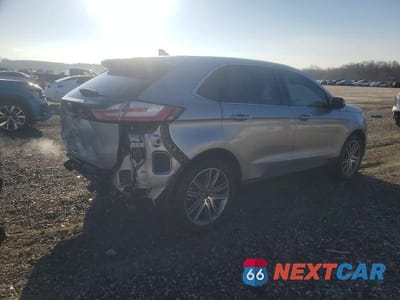Trzecie zdjęcie samochodu z tyłu: 2022 FORD EDGE TITANIUM VIN:2FMPK4K92NBA26063 - miniatura