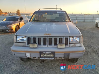 Piąte zdjęcie samochodu w środku: 1995 JEEP GRAND CHEROKEE LIMITED VIN:1J4GZ78Y8SC516397 - miniatura