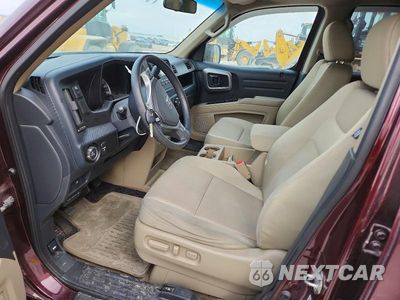 Zdjęcie 7 z 11 samochodu: 2011 HONDA RIDGELINE RTS VIN:5FPYK1F44BB003590 - miniatura