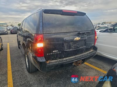 Trzecie zdjęcie samochodu z tyłu: 2010 CHEVROLET SUBURBAN K1500 LS VIN:1GNUKHE31AR225576 - miniatura