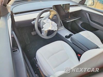 Zdjęcie 8 z 12 samochodu: 2023 TESLA MODEL Y VIN:7SAYGDEE5PF854863 - miniatura