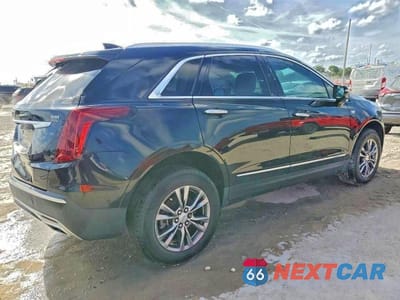 Trzecie zdjęcie samochodu z tyłu: 2021 CADILLAC XT5 PREMIUM LUXURY VIN:1GYKNCRS0MZ173433 - miniatura