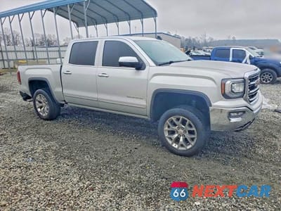 Czwarte zdjęcie samochodu z boku: 2017 GMC SIERRA C1500 SLT VIN:3GTP1NEC3HG446811 - miniatura