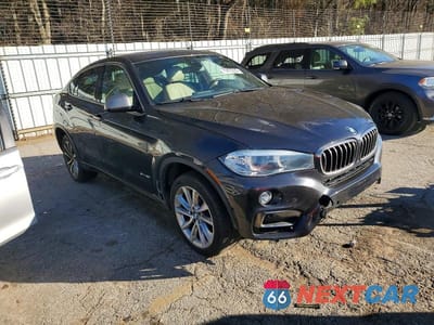 Czwarte zdjęcie samochodu z boku: 2019 BMW X6 SDRIVE35I VIN:5UXKU0C55K0S97708 - miniatura