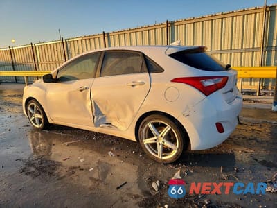 Drugie zdjęcie samochodu z przodu: 2013 HYUNDAI ELANTRA GT BASE VIN:KMHD35LE5DU073968 - miniatura