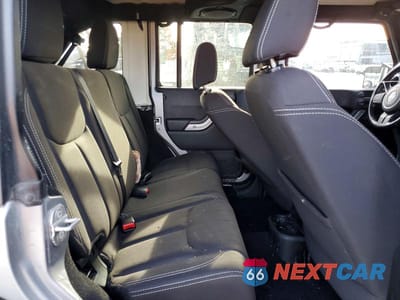 Zdjęcie 11 z 12 samochodu: 2014 JEEP WRANGLER UNLIMITED SAHARA VIN:1C4BJWEGXEL186926 - miniatura