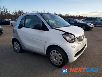 Czwarte zdjęcie samochodu z boku: 2016 SMART FORTWO VIN:WMEFJ5DA4GK082192 - miniatura
