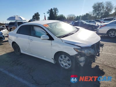 Czwarte zdjęcie samochodu z boku: 2010 TOYOTA COROLLA BASE VIN:1NXBU4EE2AZ354617 - miniatura