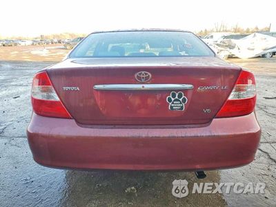 Zdjęcie 6 z 11 samochodu: 2004 TOYOTA CAMRY LE VIN:4T1BF30K04U077830 - miniatura