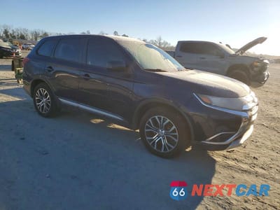 Czwarte zdjęcie samochodu z boku: 2016 MITSUBISHI OUTLANDER ES VIN:JA4AD2A39GZ008319 - miniatura