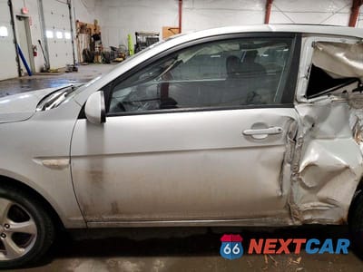 Zdjęcie 7 z 12 samochodu: 2009 HYUNDAI ACCENT SE VIN:KMHCN36C49U129118 - miniatura