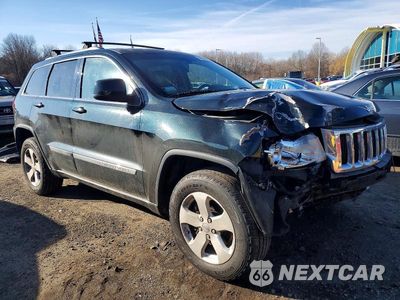 Czwarte zdjęcie samochodu z boku: 2013 JEEP GRAND CHEROKEE LAREDO VIN:1C4RJFAT0DC511440 - miniatura