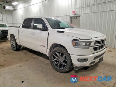 Czwarte zdjęcie samochodu z boku: 2021 RAM 1500 LARAMIE VIN:1C6SRFJT0MN676393 - miniatura