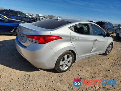 Trzecie zdjęcie samochodu z tyłu: 2012 HYUNDAI ELANTRA GLS VIN:KMHDH4AE8CU191333 - miniatura