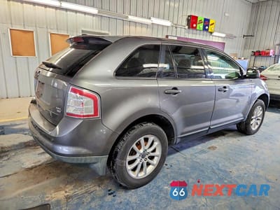 Trzecie zdjęcie samochodu z tyłu: 2010 FORD EDGE SEL VIN:2FMDK4JC6ABA11494 - miniatura