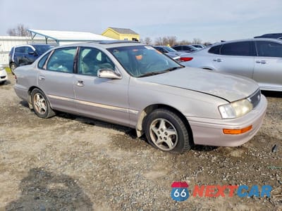 Czwarte zdjęcie samochodu z boku: 1997 TOYOTA AVALON XL VIN:4T1BF12B4VU189338 - miniatura