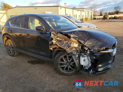 Czwarte zdjęcie samochodu z boku: 2017 MAZDA CX-5 GRAND TOURING VIN:JM3KFBDL3H0145317 - miniatura