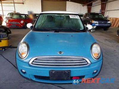 Piąte zdjęcie samochodu w środku: 2010 MINI COOPER VIN:WMWMF3C50ATU76903 - miniatura