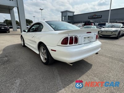 Trzecie zdjęcie samochodu z tyłu: 1997 FORD MUSTANG COBRA VIN:1FALP47V5VF111087 - miniatura