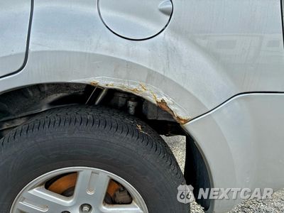 Zdjęcie 13 z 13 samochodu: 2008 MERCURY MARINER HEV VIN:4M2CU39H88KJ19095 - miniatura
