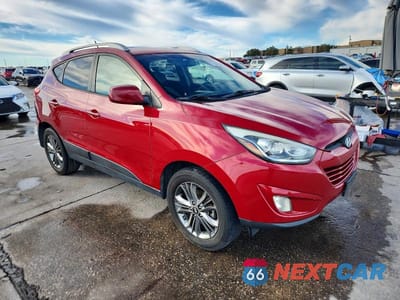 Czwarte zdjęcie samochodu z boku: 2014 HYUNDAI TUCSON SE VIN:KM8JU3AG4EU896112 - miniatura